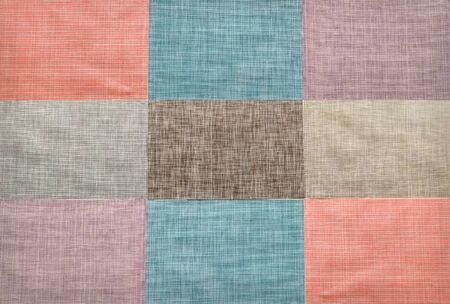 Background from different colorful pieces of cloth, closeupの写真素材