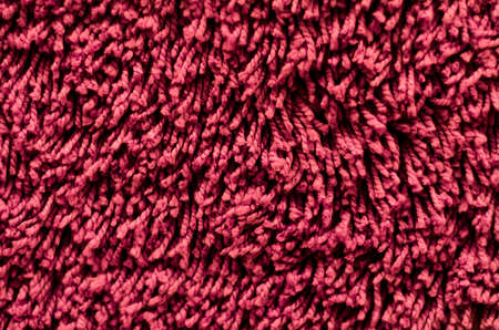Red woolen carpet background, selective focusの写真素材