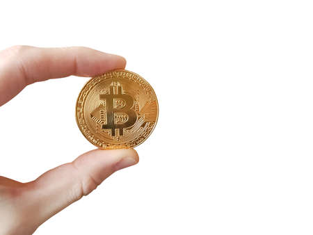 Bitcoin token in womans hand isolated on white backgroundの写真素材