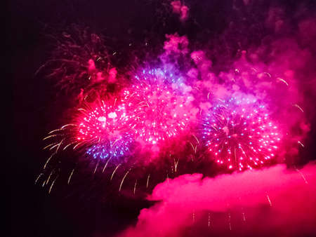 Firework in the sky at night - holiday celebrationの写真素材