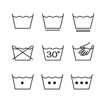 Laundry outline icons. Clothes care signs set isolated on white backgroundのイラスト素材