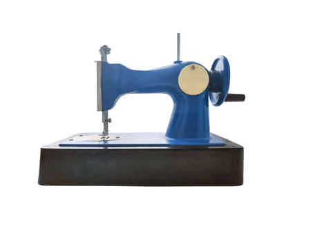 Old retro sewing machine for kids isolated on white background.の写真素材