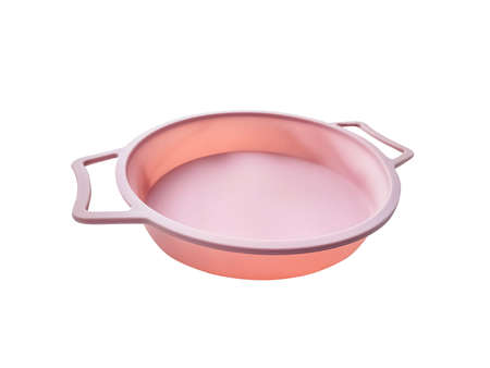 New round silicone baking dish with handles isolated on white background.の写真素材