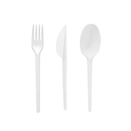 White plastic spoon, fork and knife isolated on white background.の写真素材