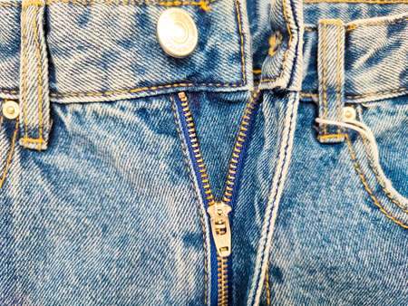 Zipper on jeans. Jeans texture. Unzipped jeans.の写真素材