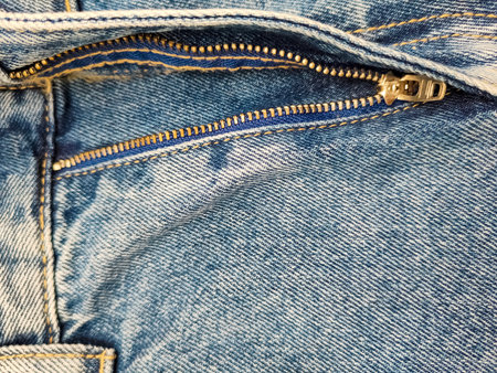 Zipper on jeans. Jeans texture. Unzipped jeans.の写真素材
