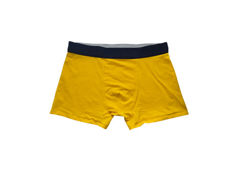 Mens boxer briefs isolated on white background. Yellow male underwear. Man trunks of elastic cotton fabric.の写真素材