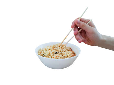 Hand with food sticks and instant noodlesの写真素材