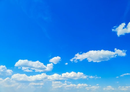 Blue sky with white clouds. Natural backgroundの写真素材