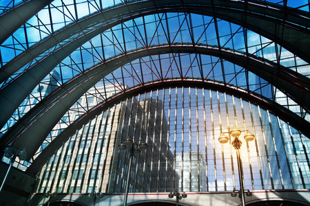 LONDON, UK - MARCH 10, 2014  Canary Wharf business aria with more than 100 000 working places  Tube entrance and early morning commutersのeditorial素材