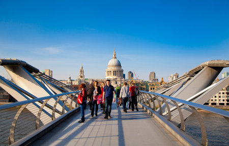 LONDON, UK - MARCH 29, 2014  South bank walk of the river Thames  View on bridges and modern architecture のeditorial素材