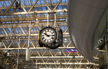 LONDON, UK - MAY 14, 2014  - Waterloo international station in the center of London, one of the main rail junction of Great Britain  Departure hall with travellersのeditorial素材