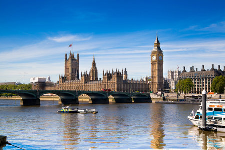 LONDON, UK - MAY 14, 2014  Big Ben, Houses of parliament and Westminster bridge on river Thames