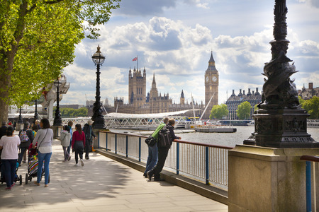 LONDON, UK - MAY 14, 2014 - Big Ben and Houses of Parliament on Thames riverのeditorial素材