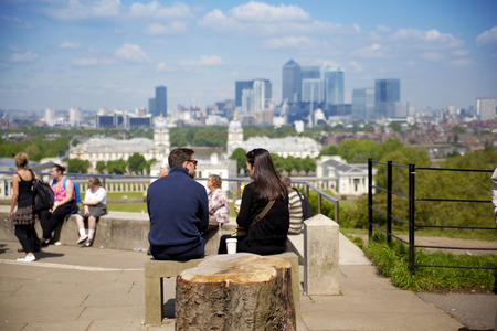 LONDON UK - MAY 15, 2014  View on business district Canary Wharf from old English park, south of London のeditorial素材