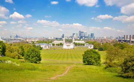 LONDON UK - MAY 15, 2014  View on business district Canary Wharf from old English park, south of London のeditorial素材