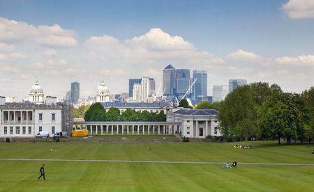 LONDON UK - MAY 15, 2014  View on business district Canary Wharf from old English park, south of London のeditorial素材