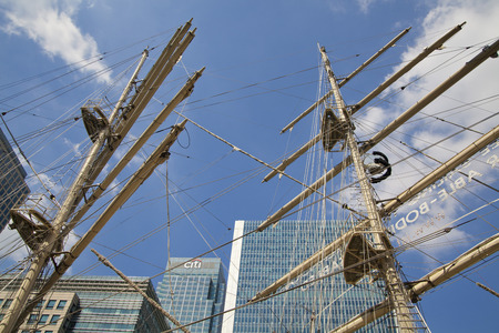 LONDON, UK - MAY 17, 2014  Old British ship based in Canary Wharf dock のeditorial素材