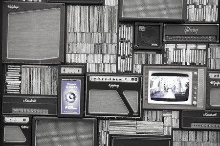 LONDON, UK - MAY 18, 2014  Decorative front panel, background made of old radio, TV, collection of dicks and video tapesのeditorial素材