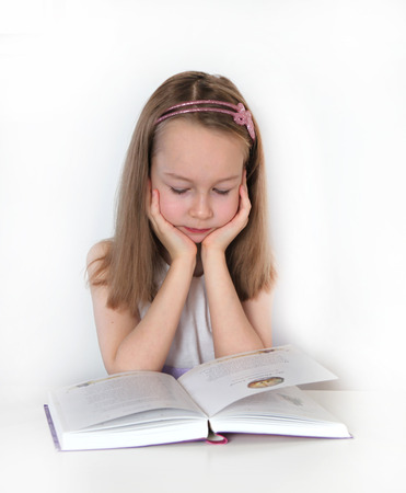 Girl reading the book  education and school conceptの写真素材