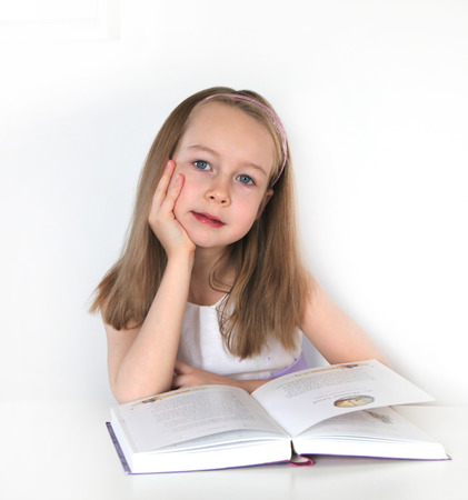 Girl reading the book  education and school conceptの写真素材
