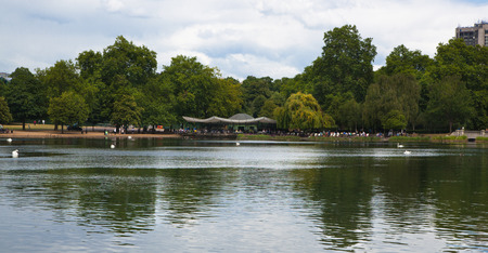 LONDON, UK - AUGUST 14, 2014: - Hyde park in the enter of London, nature island in the middle of busy capitalのeditorial素材