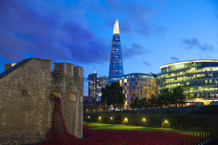 LONDON, UK - AUGUST 11, 2014: Shard of glass in night lights, view from the Tower bridgeのeditorial素材