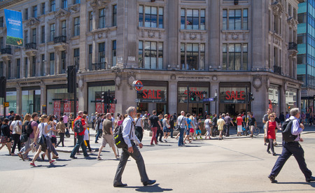LONDON, UK - JULY 29, 2014: Regent street in London, tourists crossing the junctionのeditorial素材