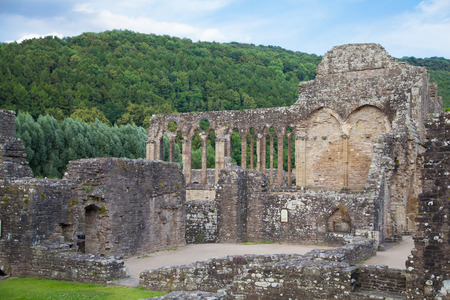 WALES, UK - 26 JULY 2014: Tintern abbey cathedral ruins. Abbey was established at 1131. Destroyed by Henry VIII. Famous as Welsh ruins from 17the century.のeditorial素材