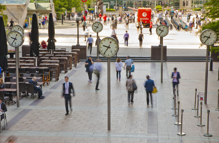 LONDON, UK - JULY 03, 2014: People blur. Office people moving fast to get to work at early morning in Canary Wharf ariaのeditorial素材