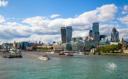 LONDON, UK - AUGUST 16, 2014: City of London view. South bank walk.