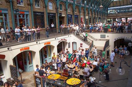 Paella in Covent Garden market, one of the main tourist attractions in London, known as restaurants, pubs, market stalls, shops and public entertaining.のeditorial素材