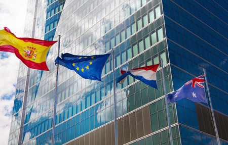 MADRID, SPAIN - July 22, 2014: International flags in Madrid city, business centreのeditorial素材