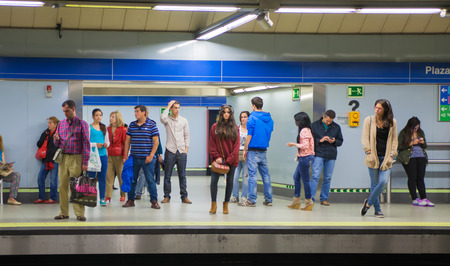 MADRID, SPAIN - MAY 28, 2014: Madrid tube station, train arriving on a platformのeditorial素材