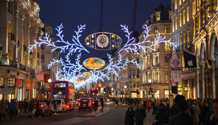 LONDON, UK - NOVEMBER 30, 2014: Black Friday weekend in London the first sale before Christmas. Regent street beautifully decorated with Christmas lights. Roads were open for pedestrians onlyのeditorial素材