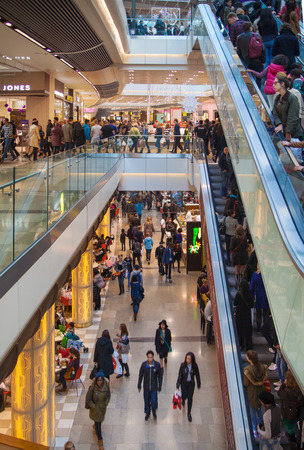 LONDON, UK - NOVEMBER 29, 2014: Westfield Stratford City Shopping centre with lots of people rushing for Christmas sale.のeditorial素材