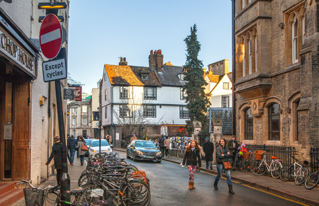 CAMBRIDGE, UK - JANUARY 18, 2015: Saint Marry passage with student\'s bikes parking on streetのeditorial素材