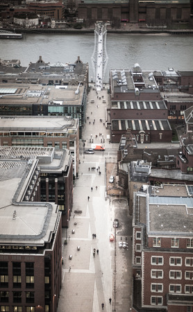 LONDON, UK - JANUARY 27, 2015: Millennium bridge and river Thames in the dusk. Panoramic view from the St. Paul cathedralのeditorial素材