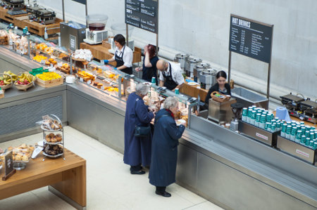 LONDON, UK - NOVEMBER 30, 2014: British museum interior of main hall with cafe in an inner yard