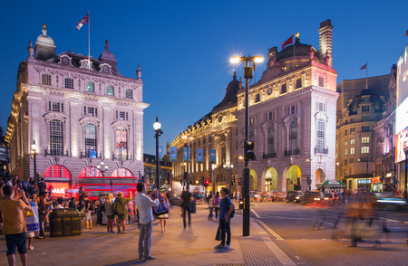 LONDON, UK - AUGUST 22, 2014: Piccadilly Circus in night. Famous place for romantic dates. Square was built in 1819 to join of Regent Streetのeditorial素材