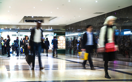 LONDON, UK - MARCH 31, 2015: Business people moving blur. People walking in rush hour. Business and modern life conceptのeditorial素材