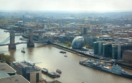 LONDON UK  APRIL 22 2015: City of London panorama includes river Thames and old battle shipのeditorial素材