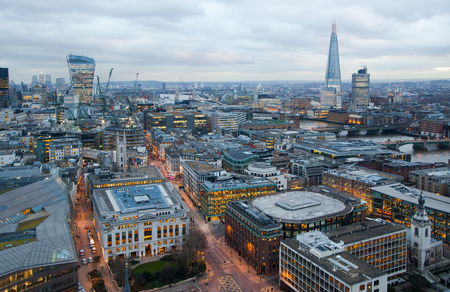 LONDON UK  JANUARY 27 2015: City of London business and banking area. London's panorama at sun set.のeditorial素材