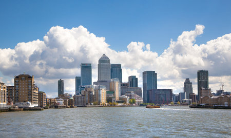 LONDON UK  APRIL 30 2015: Canary Wharf business aria view from the River Thames