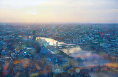 LONDON, UK - APRIL 15, 2015: City of London panorama in sunset and first night lights.