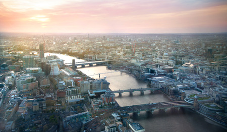 LONDON, UK - APRIL 15, 2015: City of London panorama in sunset. Tower bridge and river Thamesのeditorial素材