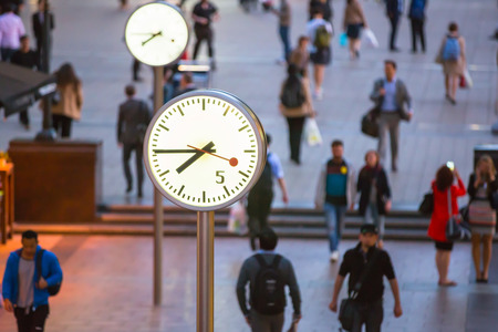 LONDON, UK - 7 SEPTEMBER, 2015: Canary Wharf business life. Business people going home after working day.のeditorial素材
