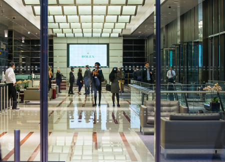 LONDON, UK - 7 SEPTEMBER, 2015: Office building entrance in night light. Canary Wharf night lifeのeditorial素材