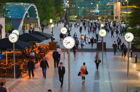 LONDON, UK - 7 SEPTEMBER, 2015: Canary Wharf business life. Business people going home after working day.のeditorial素材