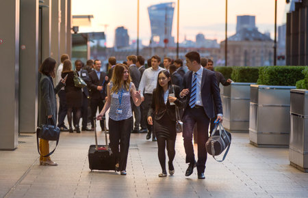 LONDON, UK - 7 SEPTEMBER, 2015: Canary Wharf business life. Business people going home after working day.のeditorial素材
